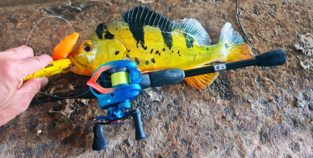Close-up view of the MAGAS Magnetic Anti-Snag System holding the single hook close to the soft silicone lure body Fishing Lure