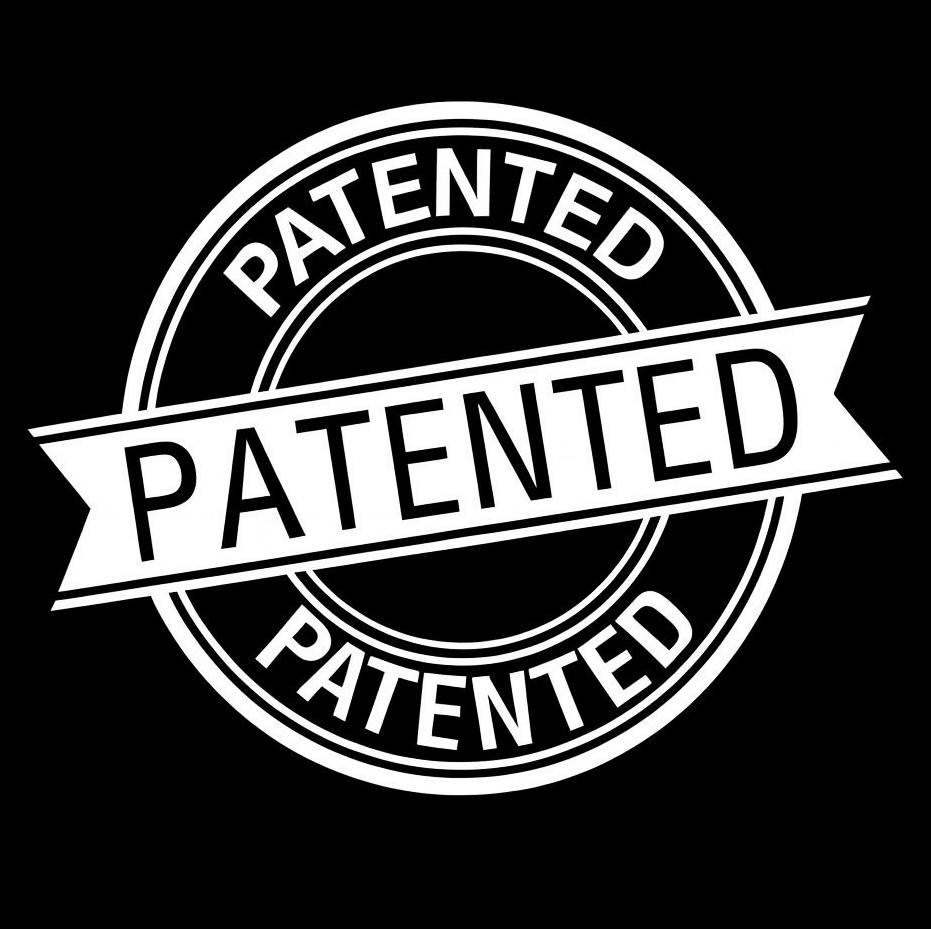 A white circular stamp design with a diagonal banner across the center reading “PATENTED,” shown on a solid black background.