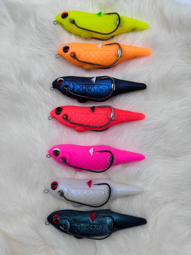Toman giant snakehead caught with MAGAS Torpedo-100 Pencil Lure soft silicone anti-snag fishing lure near heavy cover, weeds, and shallow structure