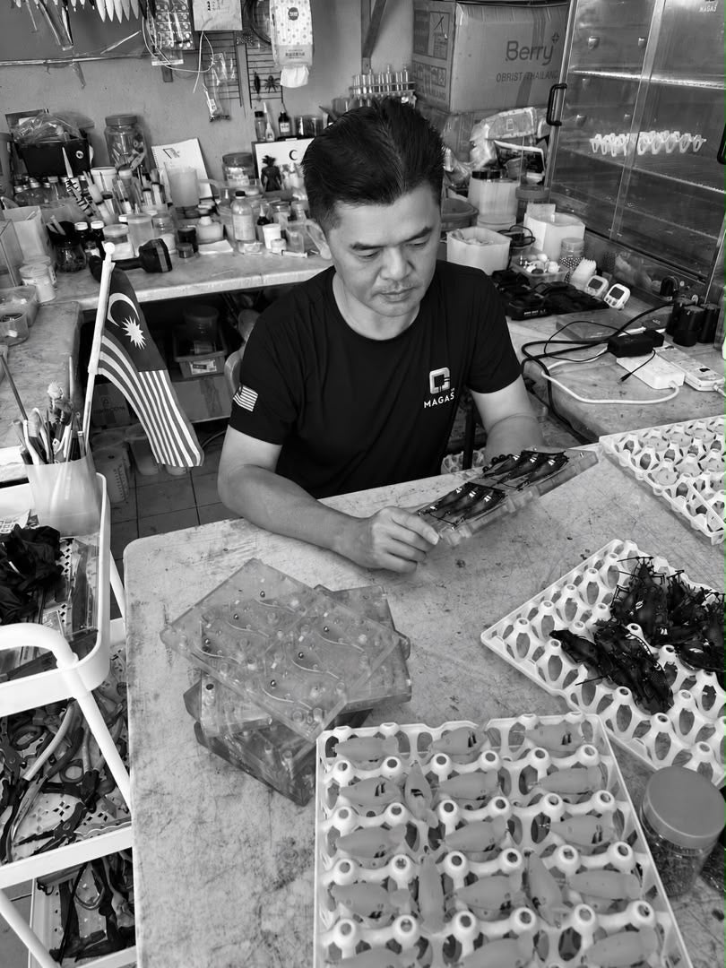 Meet the founder of MAGAS fishing lure - Andy Low Yet Sun, gazing at the molder of our products.