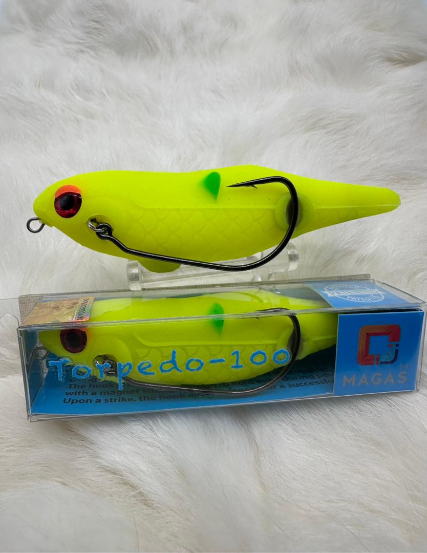 Toman giant snakehead caught with MAGAS Torpedo-100 Pencil Lure soft silicone anti-snag fishing lure near heavy cover, weeds, and shallow structure.
